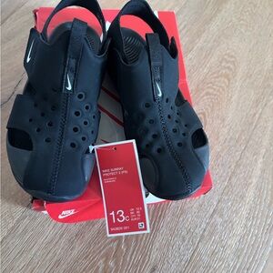 Nike kids waterproof shoes.